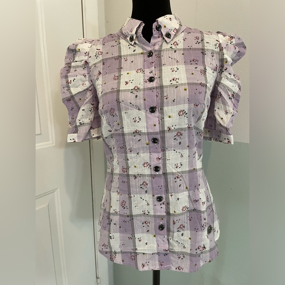 Only Women’s shirt size M runs like S